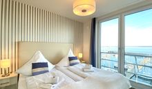 Apartment 25, Pier 25, Apartmenthaus Hafenspitze Blickrichtung offene See/Strand