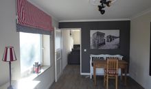 Wohnzimmer mit offener Küche & Essbereich