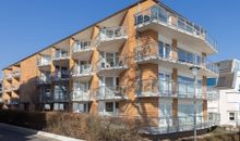 Reihenferienhaus mit Kamin und Terrasse im Ostseeland OFC 11