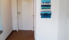 Retro-Apartment in zentraler Lage: Entspannen im Familienbungalow mit Garten (9228)