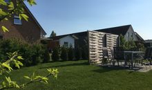 Retro-Apartment in zentraler Lage: Entspannen im Familienbungalow mit Garten (9228)