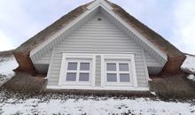 Winteridylle am Reetdachhaus