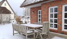 Winteridylle am Reetdachhaus