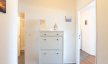 Ferienwohnung Ostseeschnucke Flur mit Kommode