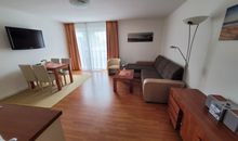 Wohnzimmer mit Schlafsofa