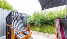 moderne Wohnwand TV großzügige Terrassenfenster