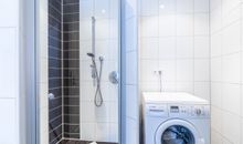 Dusche Waschmaschine