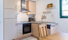 Waschraum mit Waschmaschine und Trockner