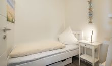 Raum mit Einzelbett, ohne Fenster