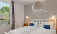 Schlafzimmer mit Doppelbett