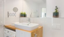Badezimmer mit Waschmaschine