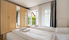 Schlafzimmer mit Balkon
