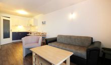Wohnzimmer mit Sitzecke