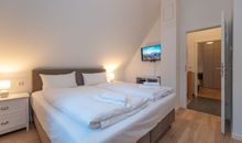 Ferienhaus Am Leuchtturm, Ferienzimmer 1 Möwe
