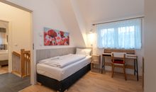 Ferienhaus Am Leuchtturm, Ferienzimmer 1 Möwe