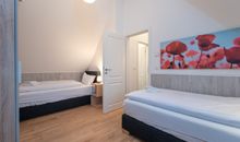 Ferienhaus Am Leuchtturm, Ferienzimmer 1 Möwe