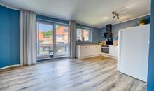 Wohnzimmer mit Küche