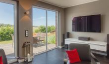 Wohnbereich mit TV und WLAN und Aussenjalousie