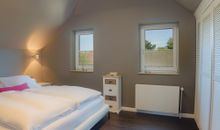 1.Schlafzimmer im 1.OG mit Doppelbett