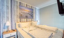 Schlafbereich mit Doppelbett