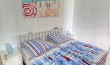 Schlafbereich mit Doppelbett