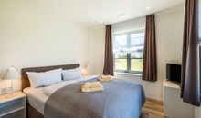 Schlafzimmerbeispiel mit Boxspring-Doppelbett