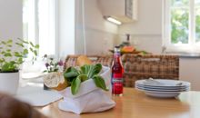 Wohnzimmer mit Küche