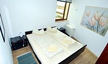 Schlafzimmer mit Einzelbetten im EG