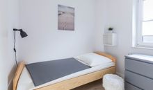 Schlafzimmer mit Einzelbetten im EG