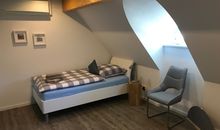 Schlafzimmer mit Einzelbetten