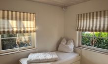 KInderzimmer mit Etagenbett und ausziehbarem Einzelbett