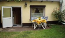 großzügiger Wohn- / Essbereich mit offener Küche und Zugang zum Balkon