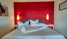 Schlafbereich mit Doppelbett
