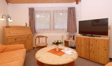 Wohnbereich im Strandbungalow-Apartment 78 m²