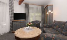 Wohnbereich im Strandbungalow-Apartment 56 m²