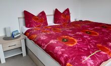 Schlafzimmer mit Doppelbett