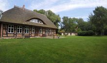 Bungalow mit Terrasse und Strandkorb