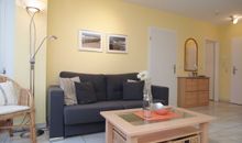 Das gemütliche Wohnzimmer mit Sitzecke
