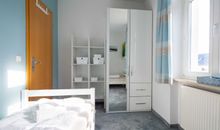 Das zweite Schlafzimmer mit zwei Einzelbetten