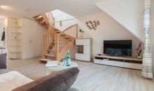 Schneckenhaus Ferienhaus - Blick vom Sofa auf den TV