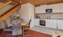 Wohnzimmer offene Balken