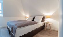 Wohnzimmer mit Balkonzugang