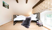 heimeliges Schlafzimmer im Obergeschoss