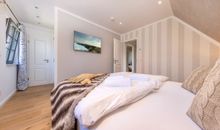 Ferienhaus An der Ostsee by Seeblick Ferien ORO, direkte Wasserlage,Sauna,E-Säule