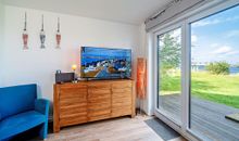Ferienhaus An der Ostsee by Seeblick Ferien ORO, direkte Wasserlage,Sauna,E-Säule
